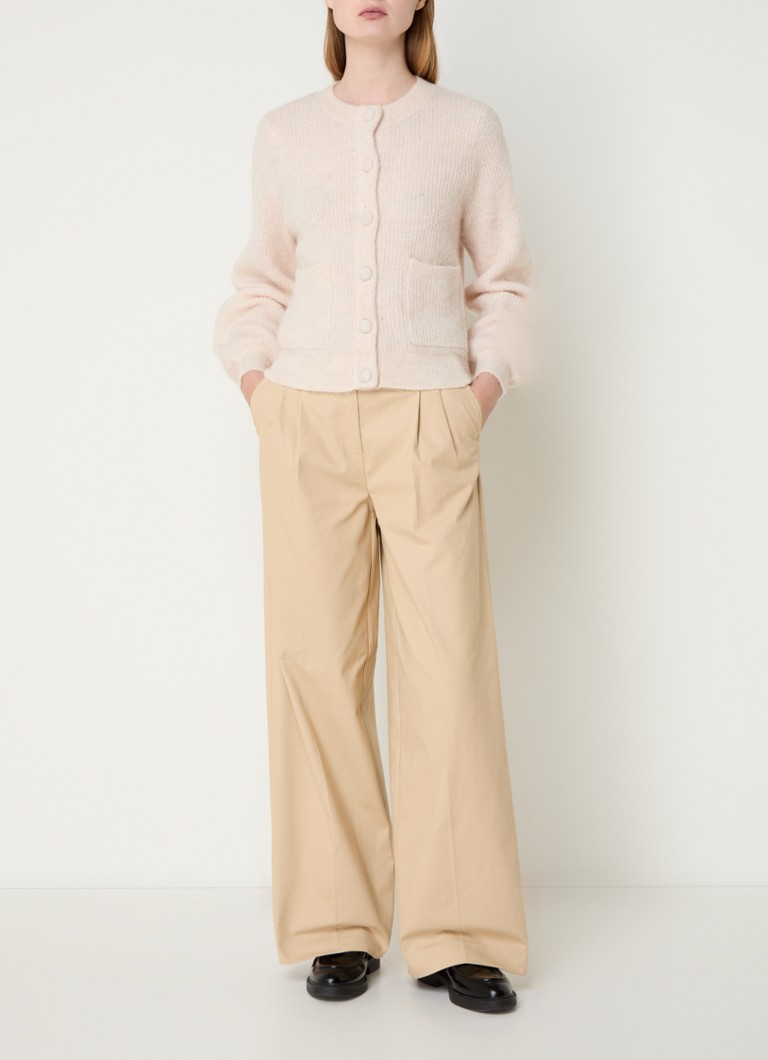 Pantaloni chino de damă Iben, cu talie înaltă, lejeri pe picioare și buzunare laterale.