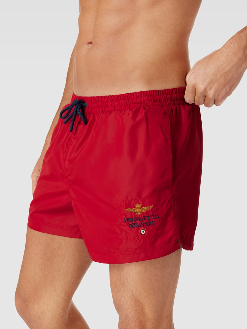 Badeshorts mit Label-Stitching Modell 'COSTUME' in rot
