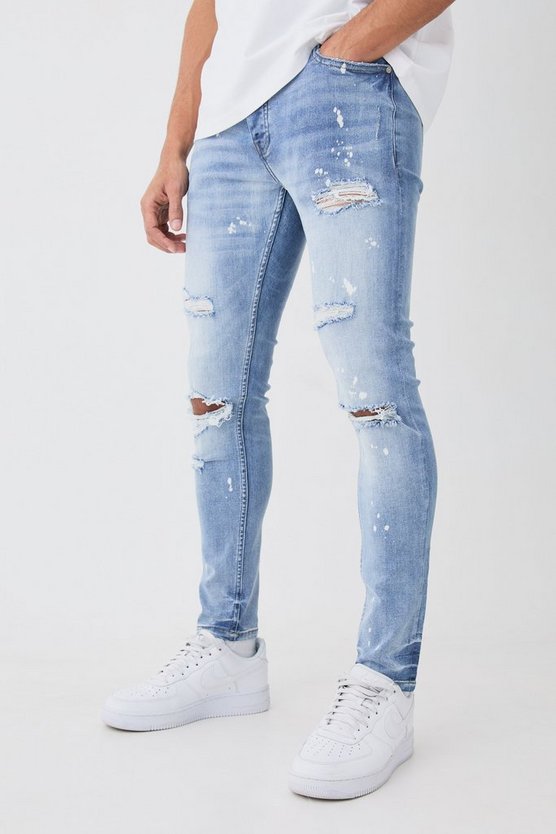 Zerrissene Skinny Stretch Jeans mit Farbspritzern