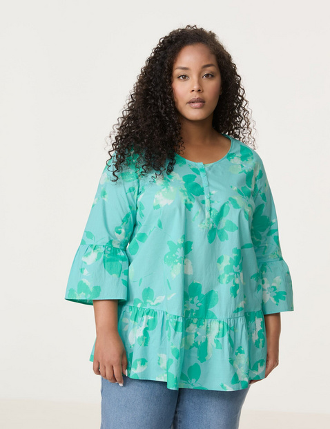 Ausgestellte Bluse mit Volants