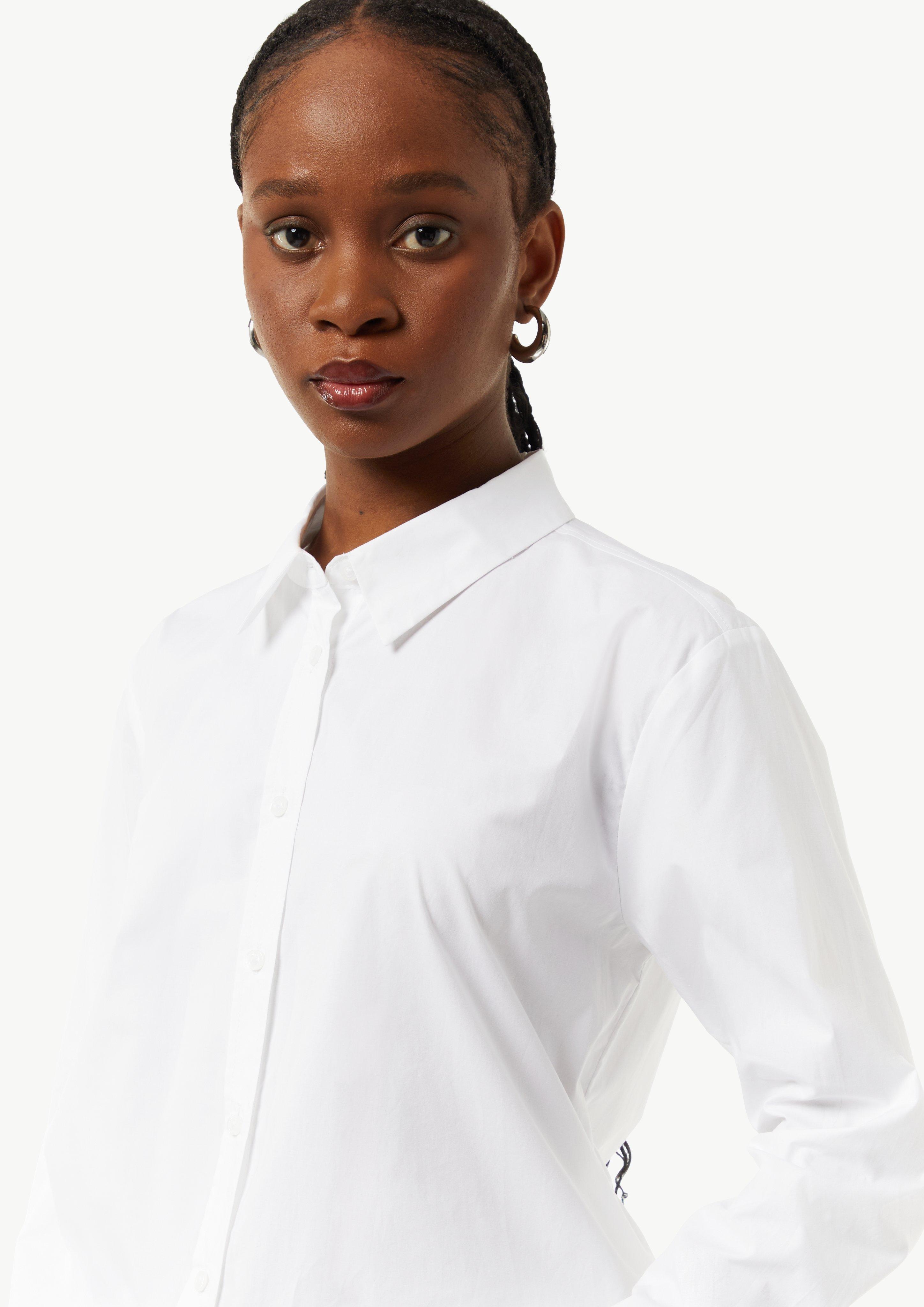 Locker geschnittene Baumwollbluse mit Eingrifftaschen - weiß