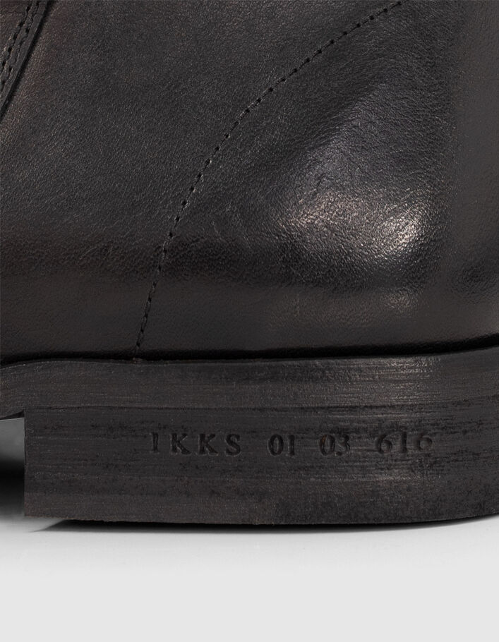 Boots noires en cuir avec bride à boucle Homme