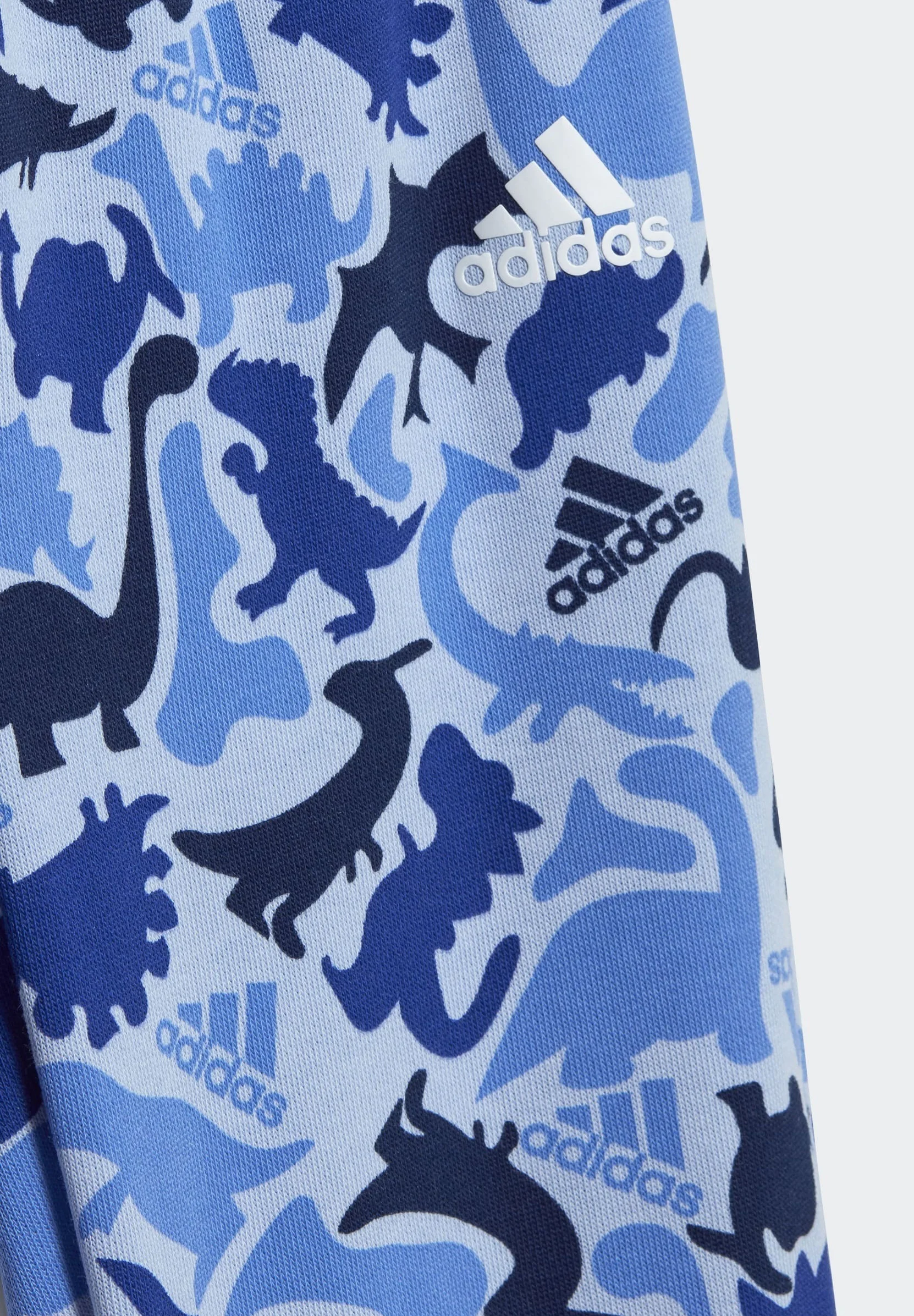 adidas Sportswear Conjunto francés con estampado integral de camuflaje dinosaurio - Chándal