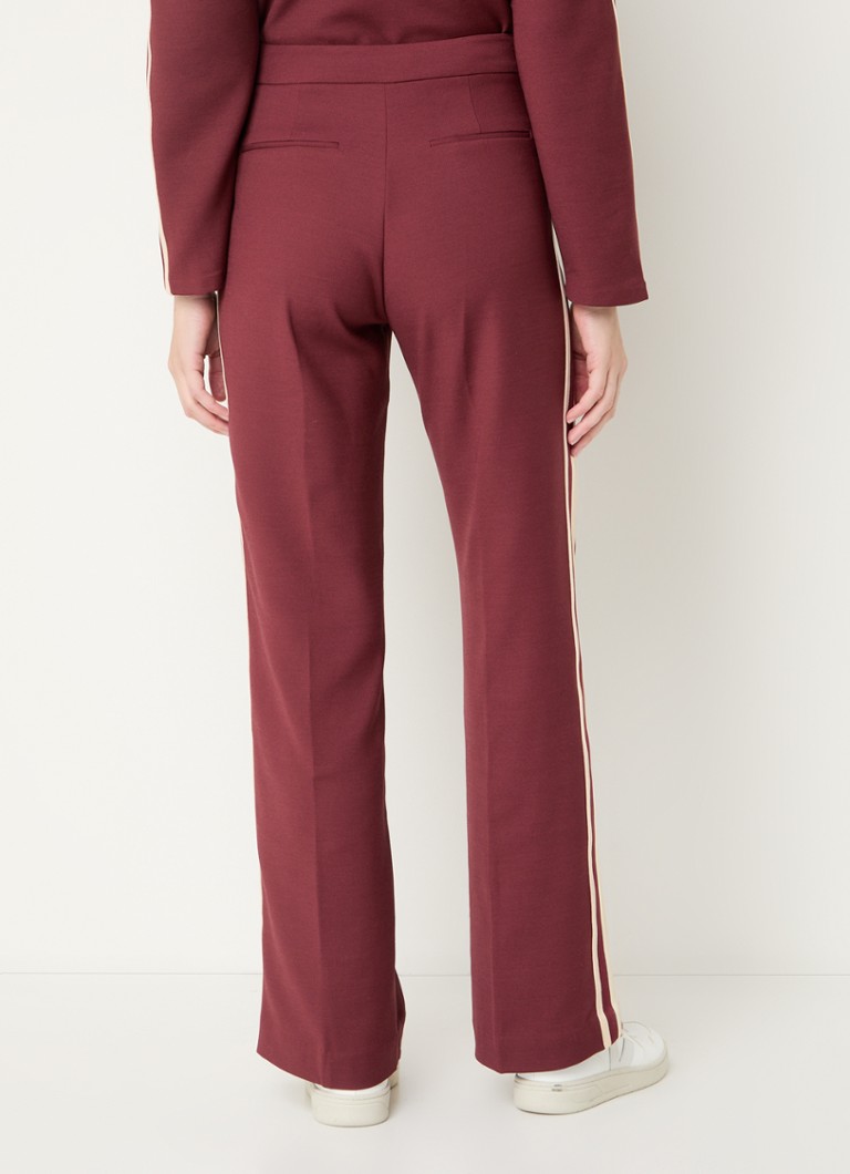 Pantaloni cu talie înaltă, croială largă și buzunare cu fermoar de la Ba&sh Soda
