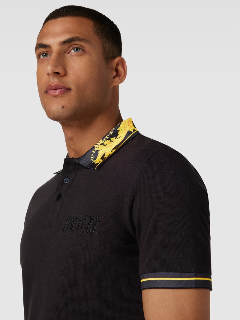 Poloshirt mit Kontraststreifen in schwarz