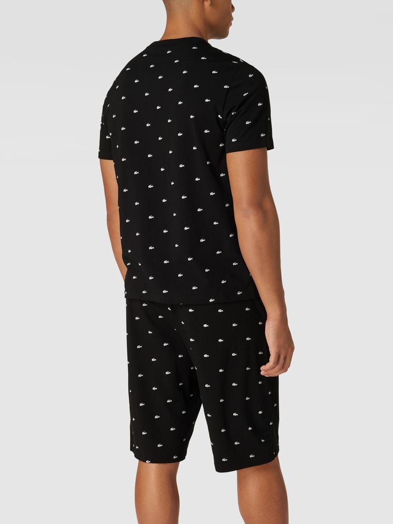 Pyjama mit labeltypischem Allover-Print in schwarz