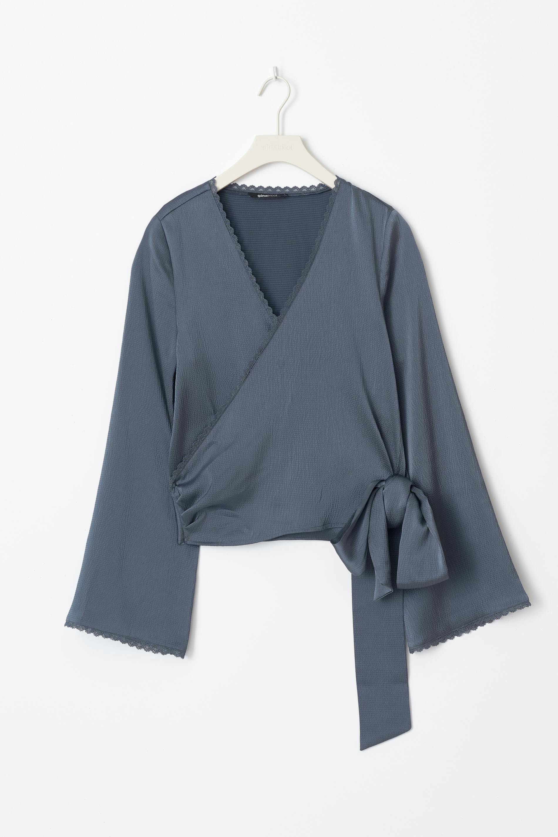 Scalloped edge wrap blouse