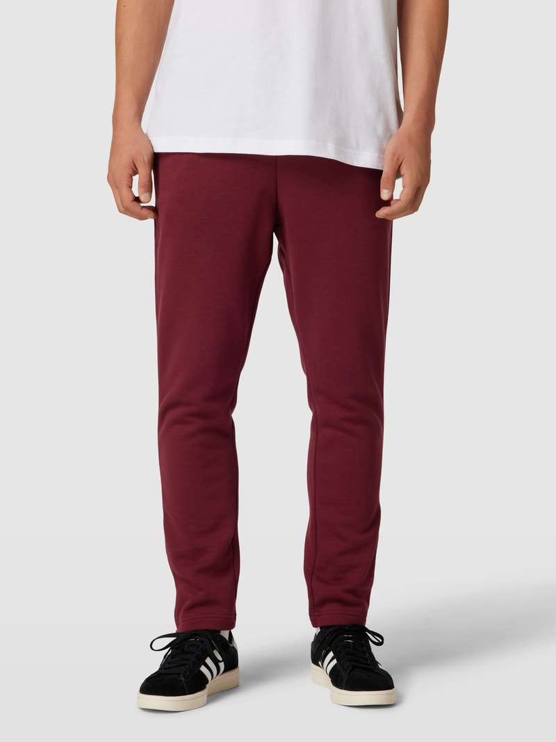 Sweatpants mit Label-Stitching in bordeaux rot