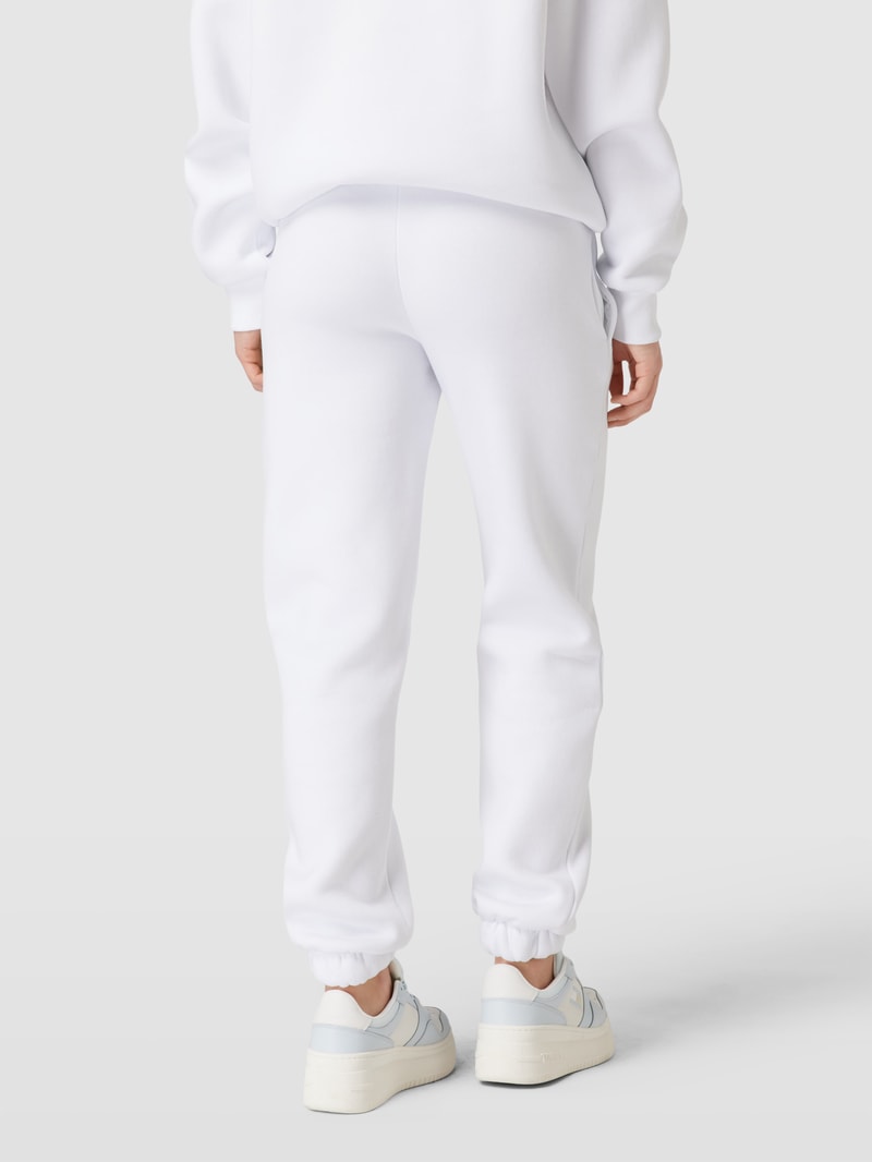 Sweatpants mit Label-Print in weiß