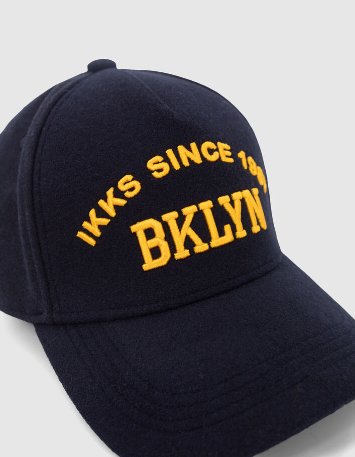 Casquette marine feutrée broderie typo jaune Homme