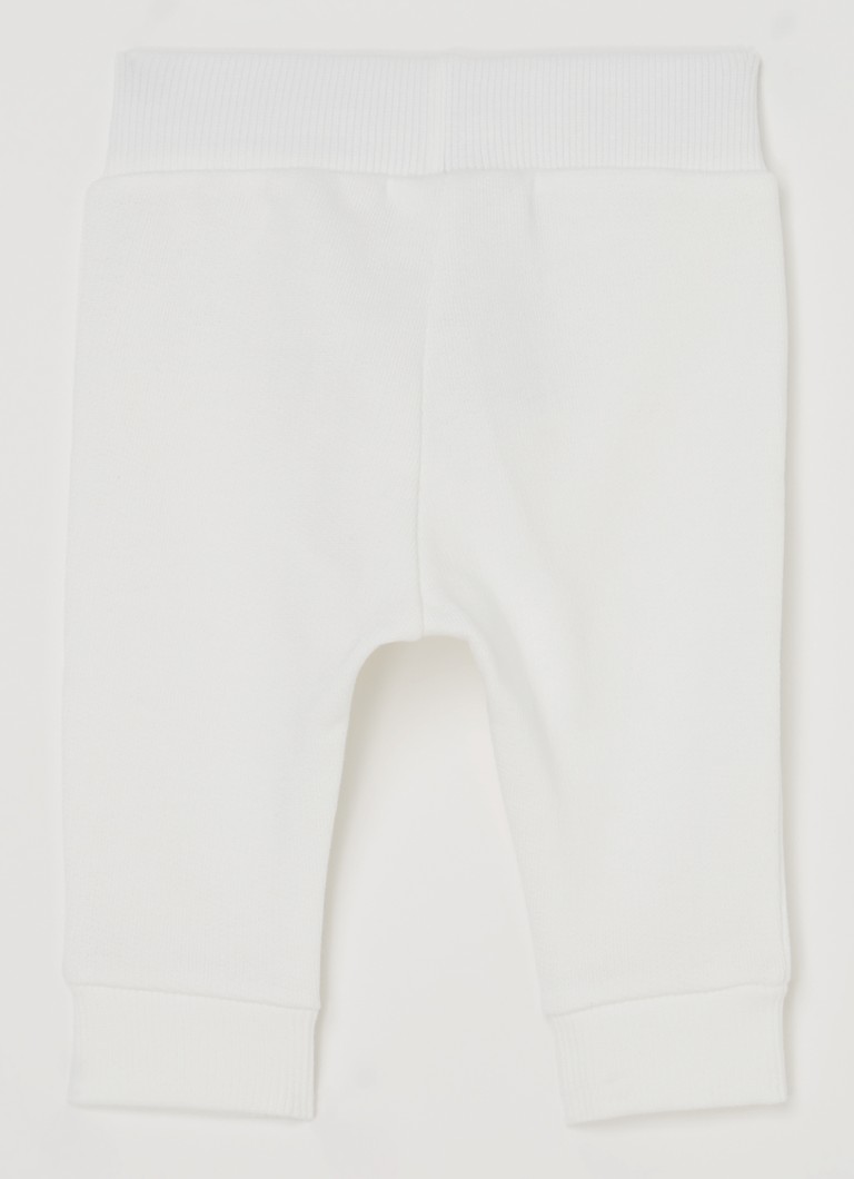 Pantaloni de trening Benetton cu croială conică și broderie.