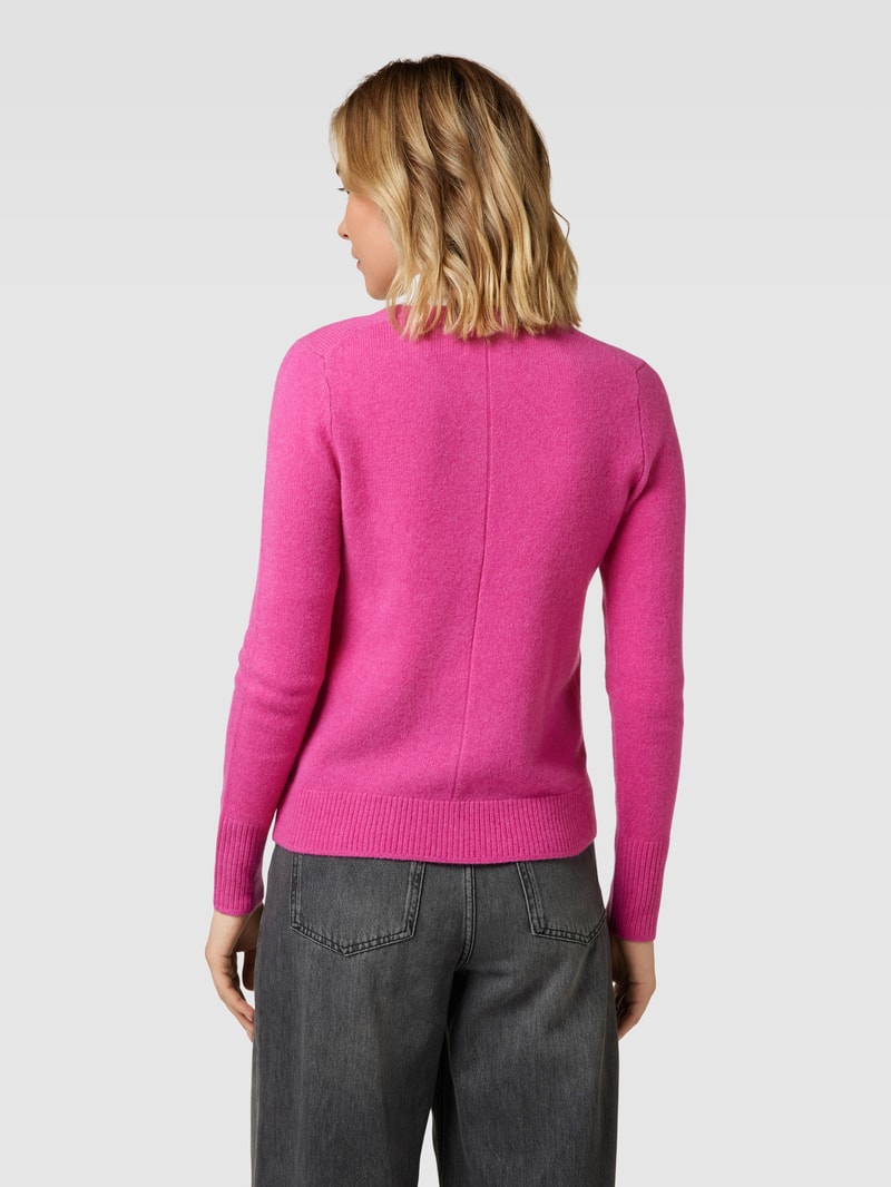 Strickjacke mit Knopfleiste und Eingrifftaschen in fuchsia