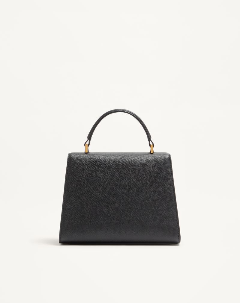 Bolsa Valentino Garavani Vsling pequena em couro de bezerro granulado.