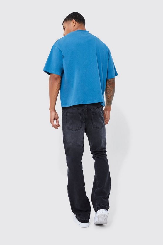 Slim-Fit Schlagjeans mit Kreuz-Applikation