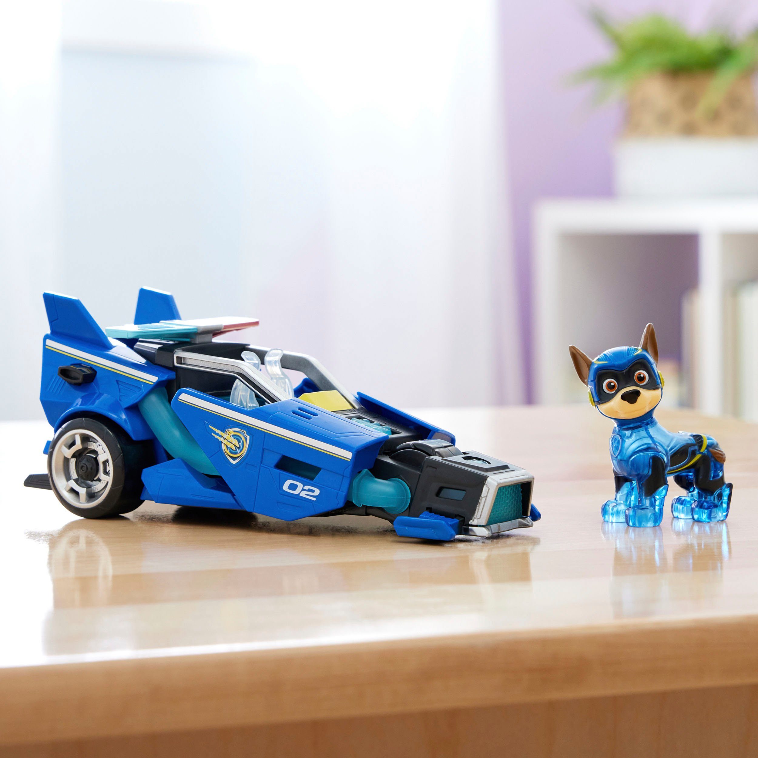 Spin Master Spielzeug-Auto PAW Patrol, Der Mighty Kinofilm: Superhelden-Basis-Fahrzeug von Chase, Polizeiauto mit Welpenfigur, Licht- und Soundeffekt