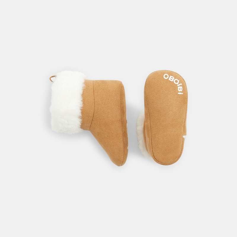 Boots fourrées beige naissance
