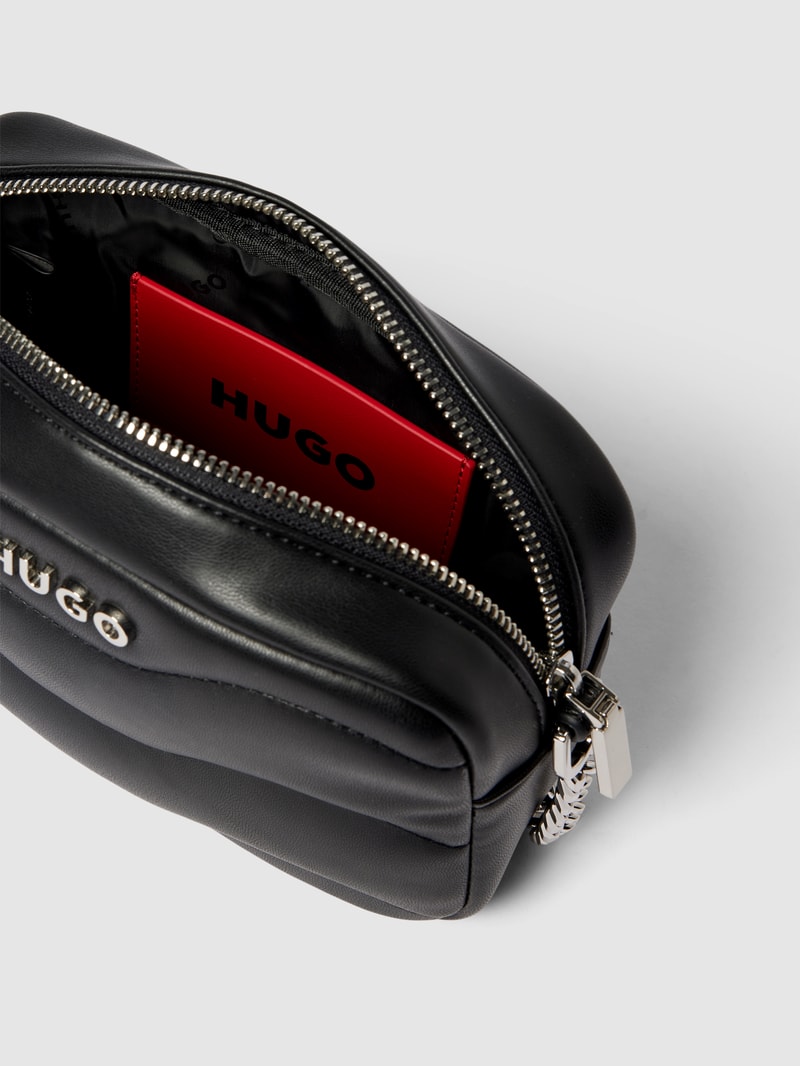 Handtasche mit Steppnähten Modell 'Lizzie' in schwarz
