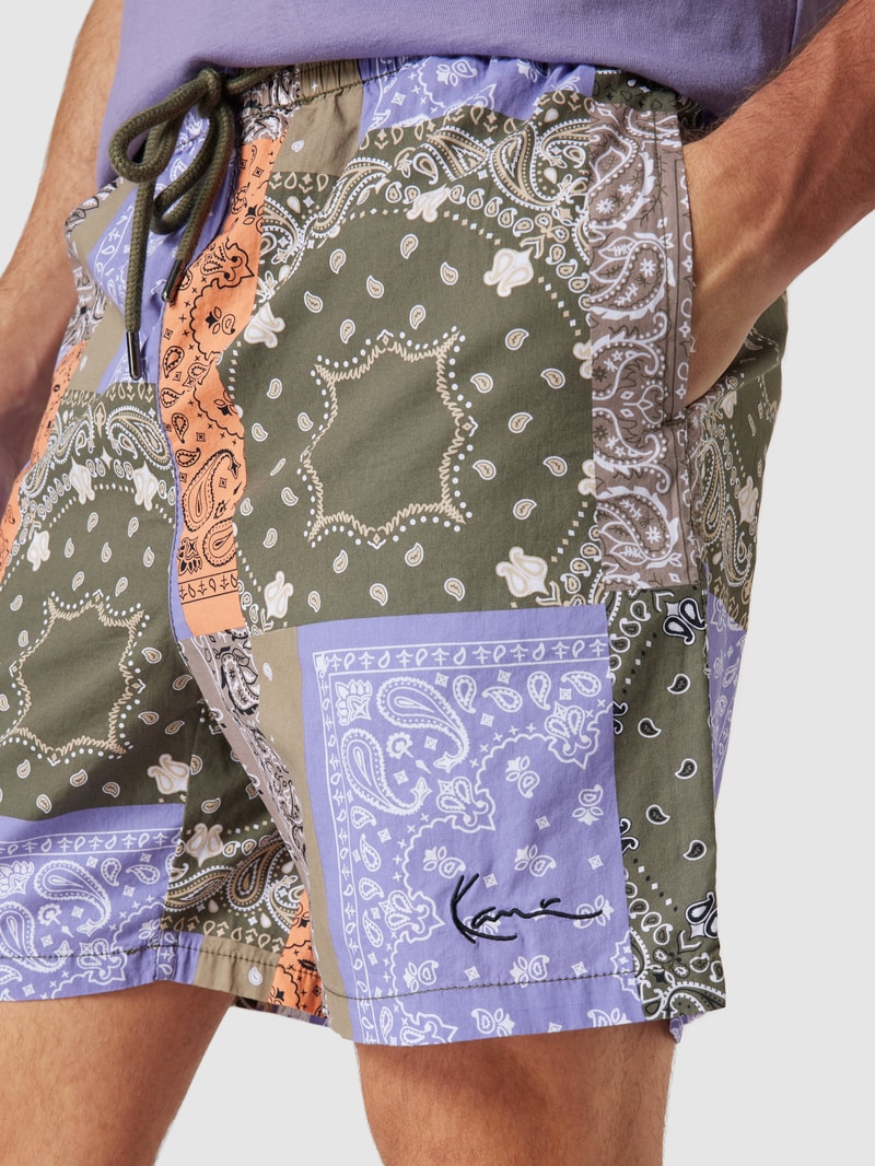 Shorts mit grafischem Allover-Muster in beige
