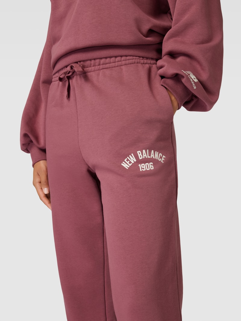Sweatpants mit Logo-Print Modell 'Essentials Varsity' in dunkelrot