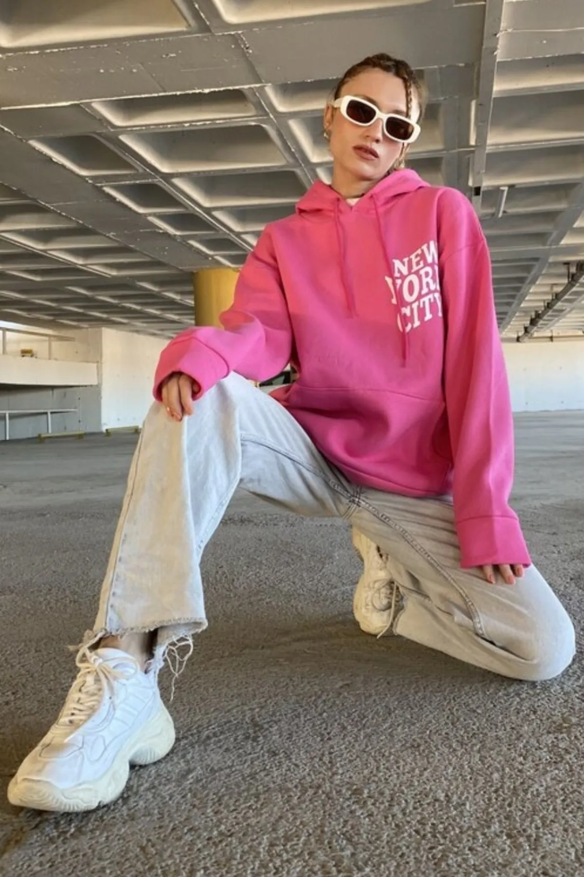 MODAGEN  Rosafarbenes New York City-Kapuzen-Sweatshirt mit Aufdruck für Damen