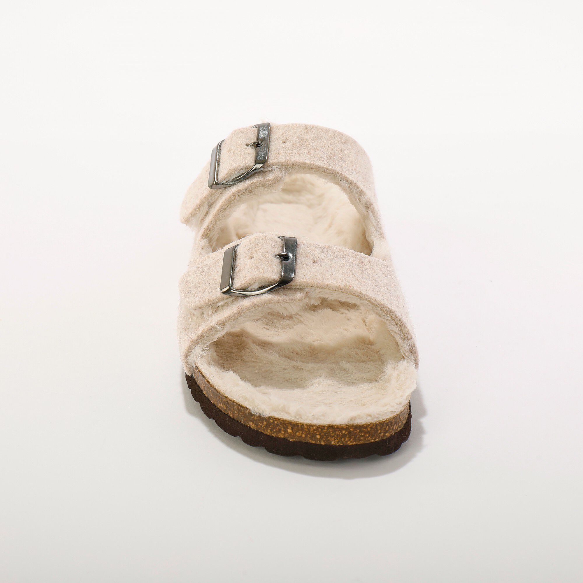 Mules fourrées à boucles