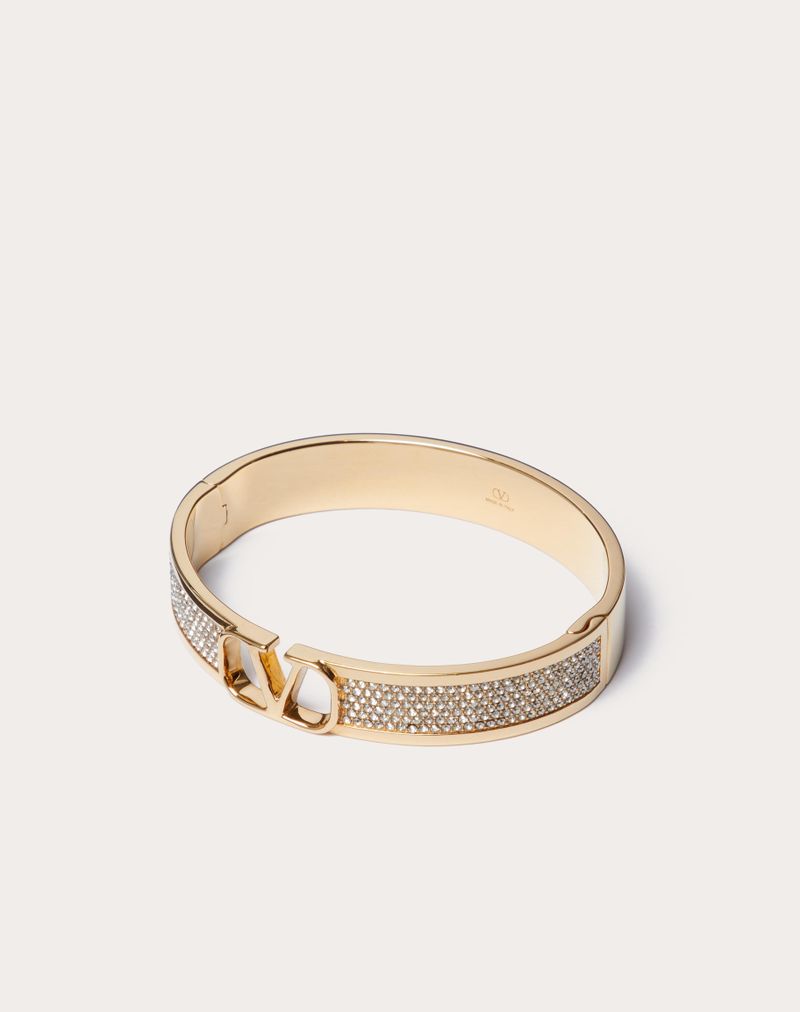 PULSEIRA DE ASSINATURA VLOGO EM METAL E CRISTAIS SWAROVSKI®