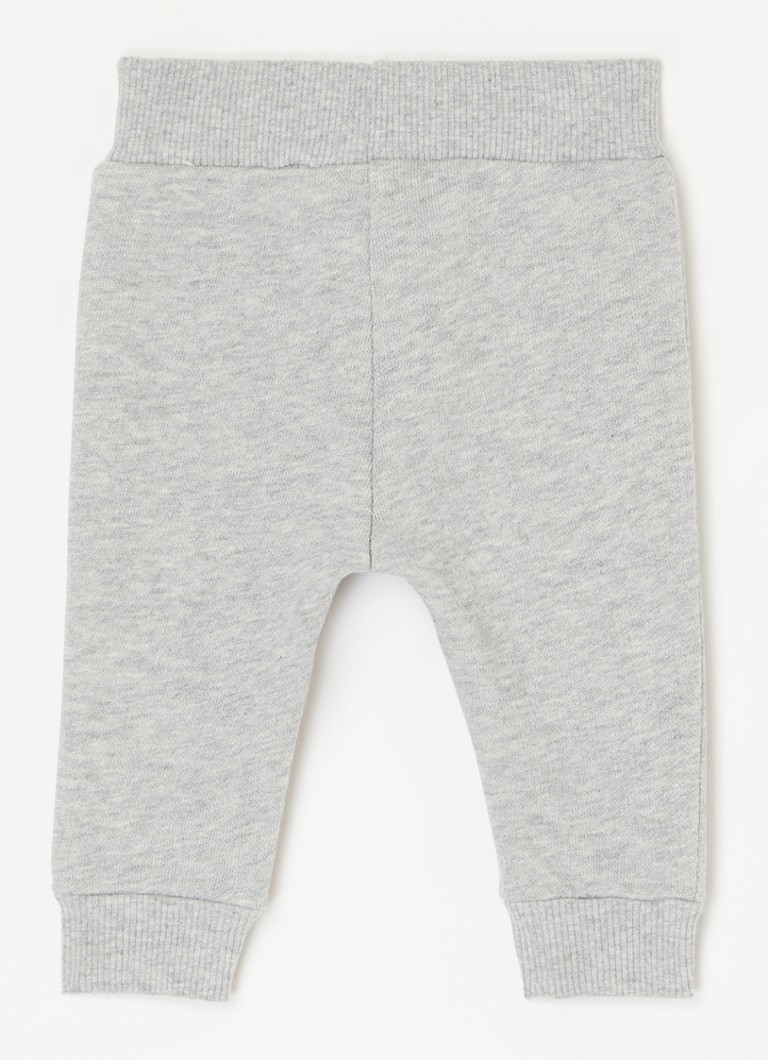 Pantaloni de trening Benetton cu croială conică și broderie.