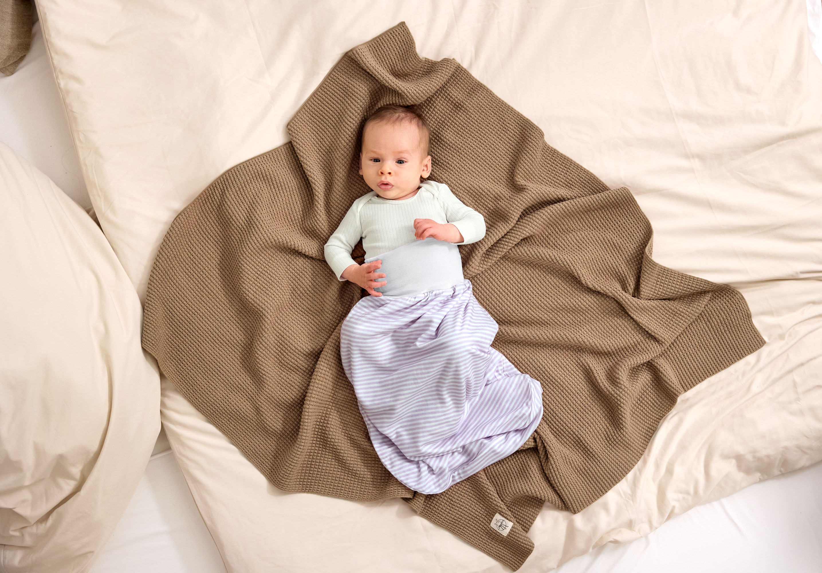 Baby Strampelsack 0,5 TOG - Gestreift, Lila Milky