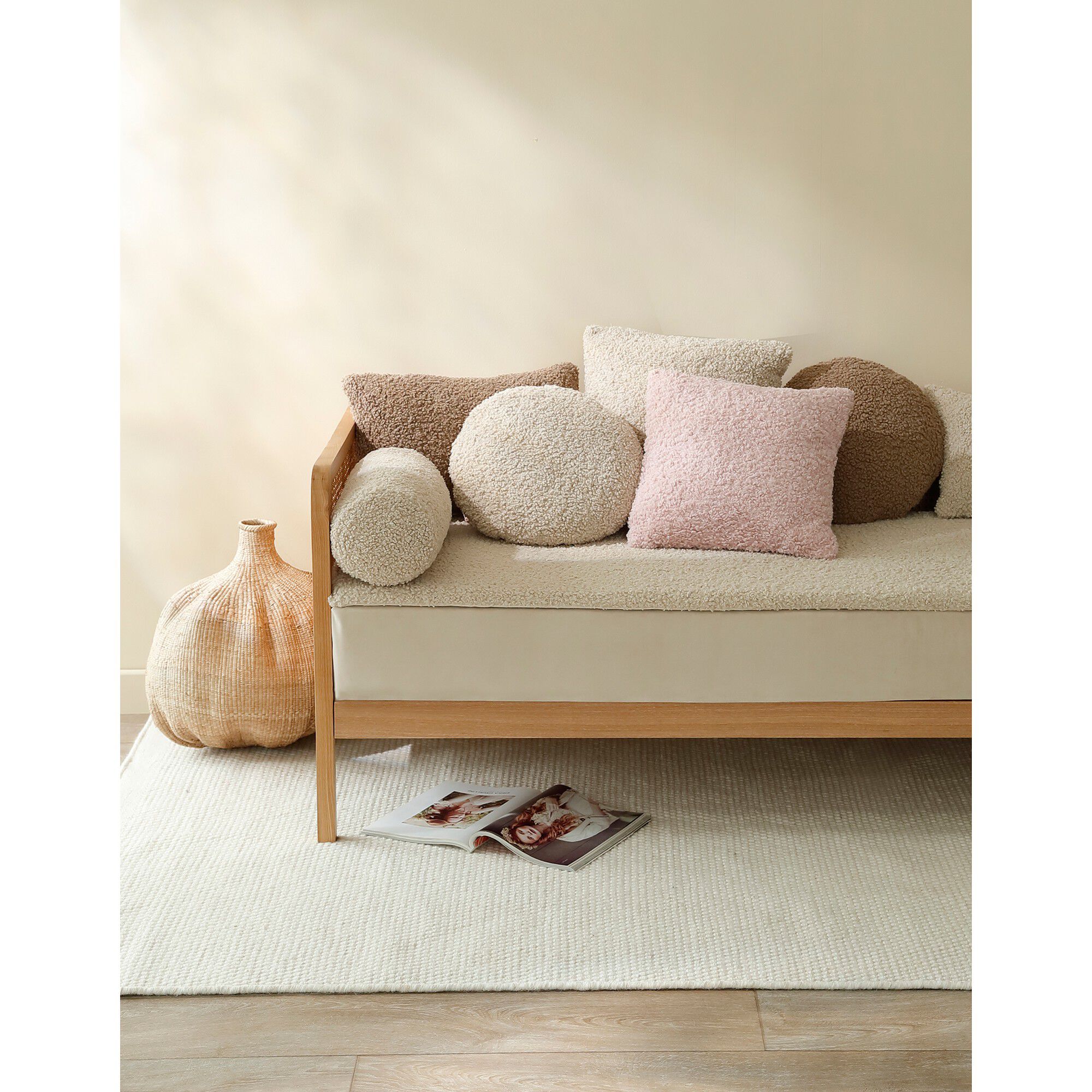 Coussin rond en bouclette sherpa moutonnée