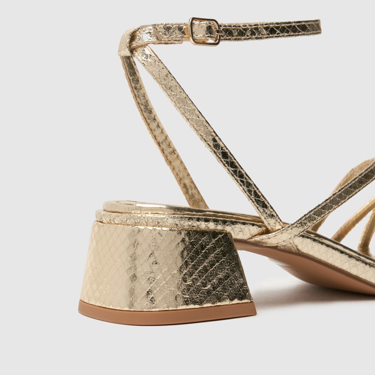 Schuh Sander – Guldfärgade sandaler med remmar