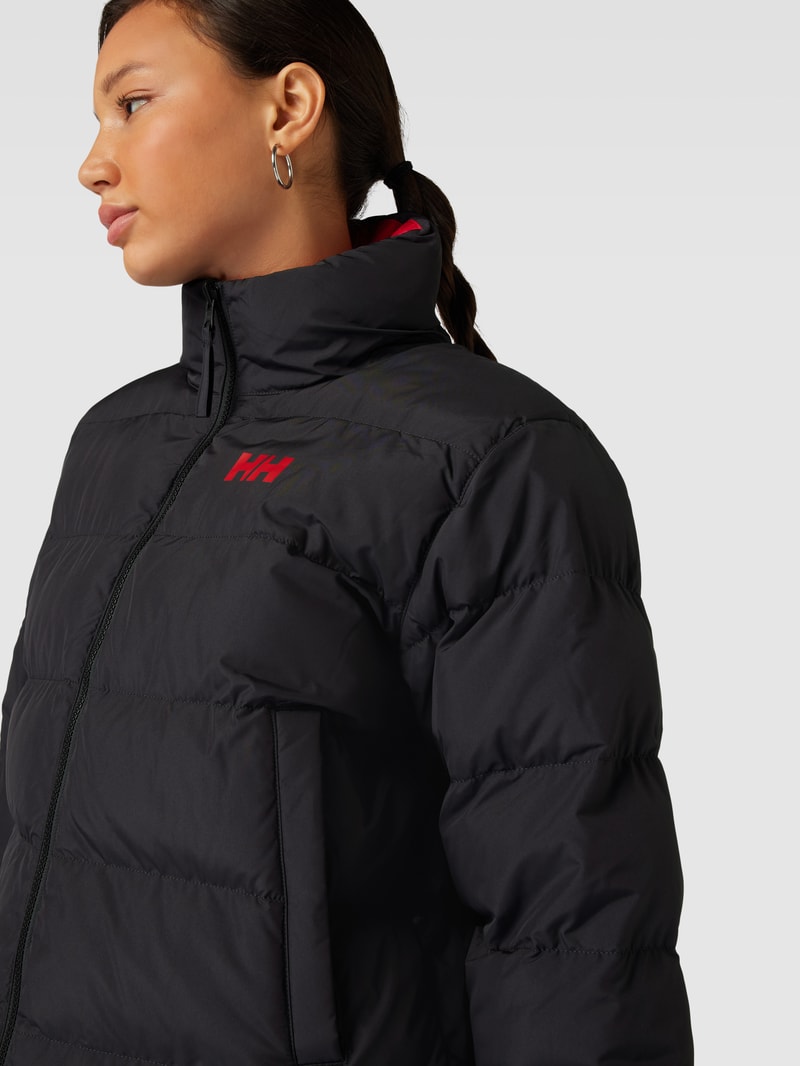 Steppjacke mit Wendefunktion in schwarz
