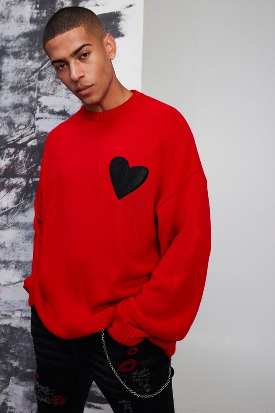 Oversize Pullover mit ausgefranstem Saum und Herz-Detail