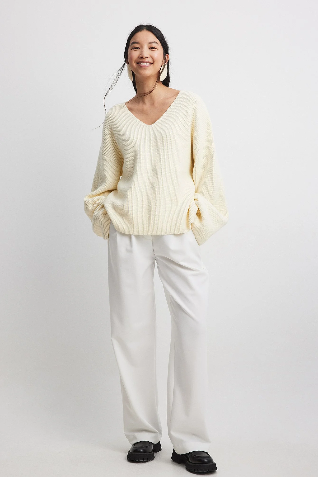 V-Ausschnitt Strickpullover