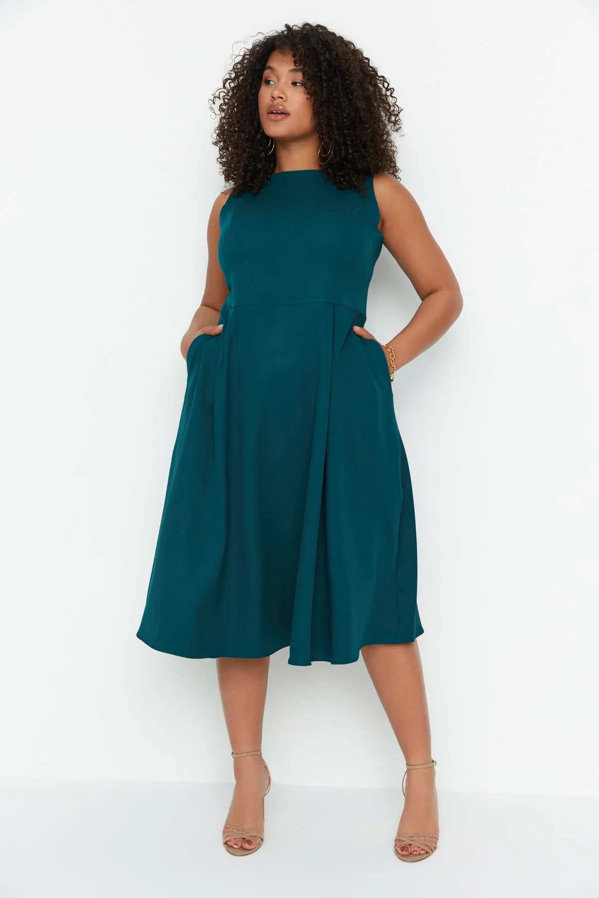 Trendyol Curve  Petrolblaues A-Linien-Kleid mit gewebten Taschen und Details TBBSS22EL1598