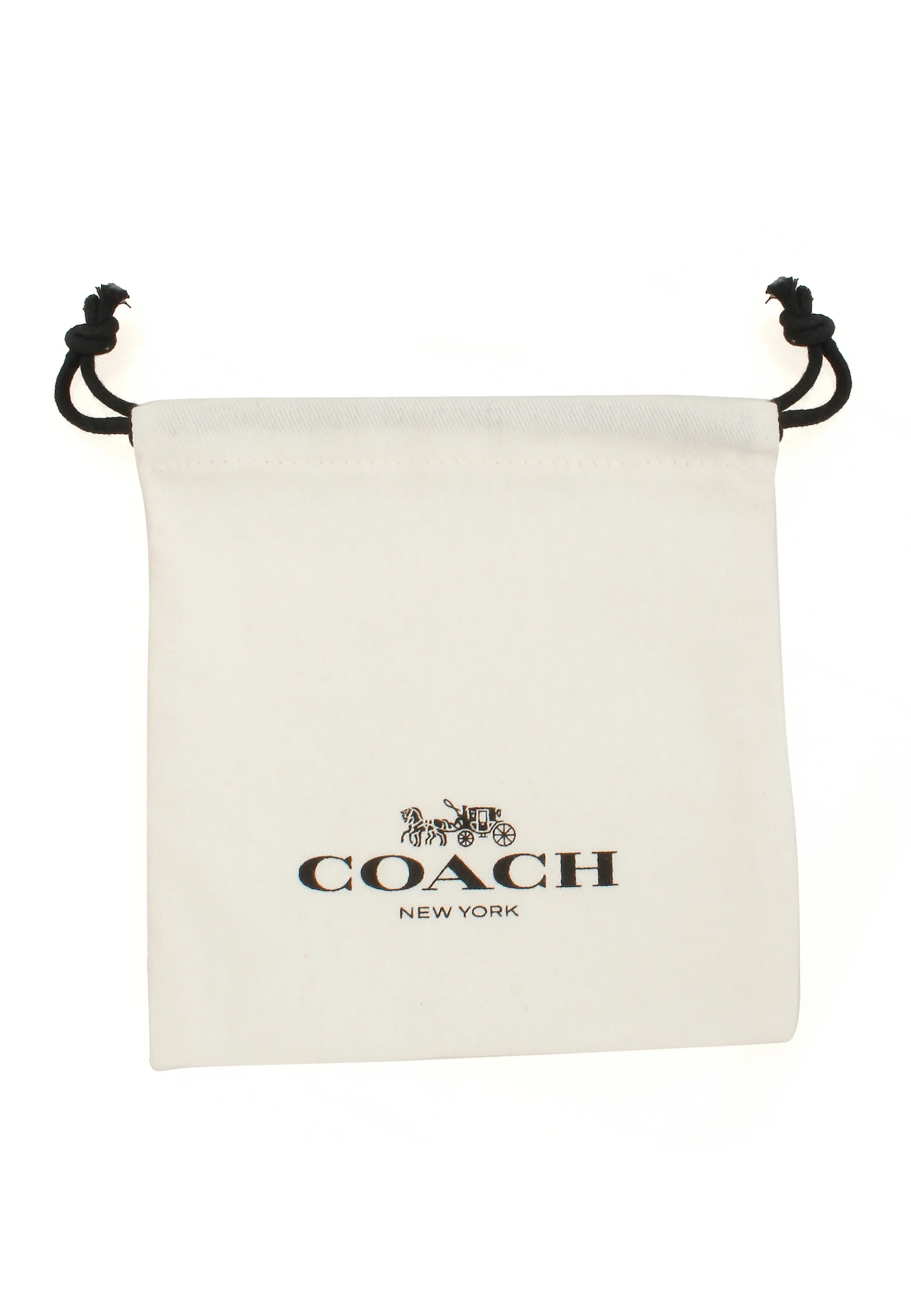 Pulsera Coach con dije de corazón de cristal