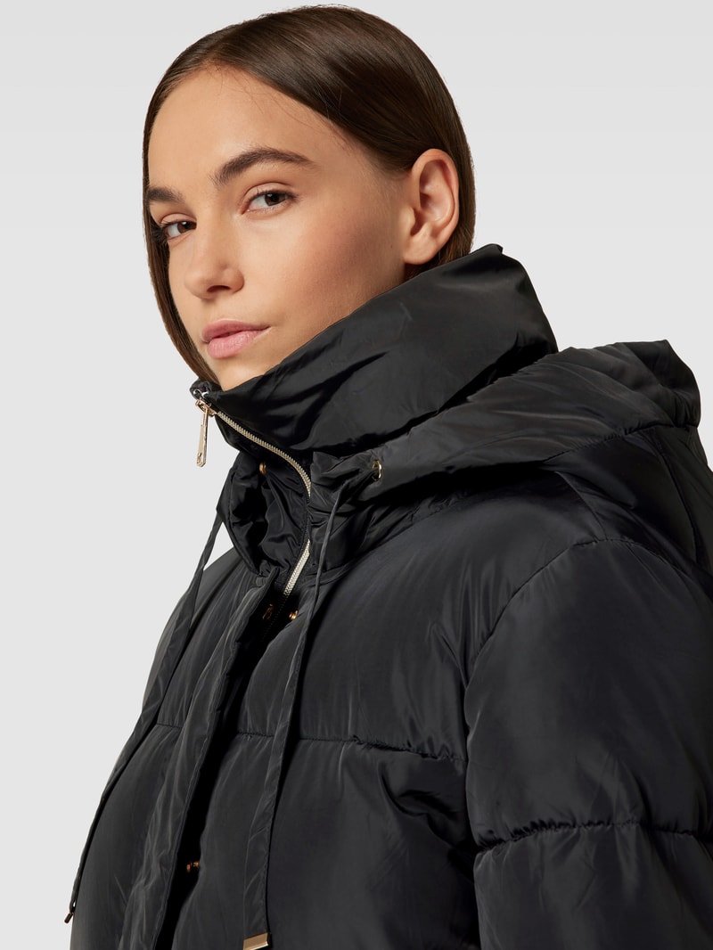 Steppjacke mit verdecktem Reißverschluss in schwarz
