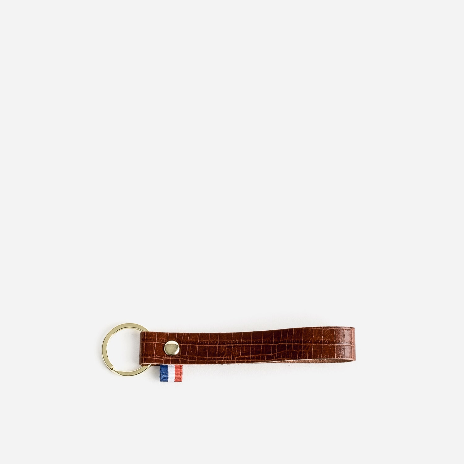 Porte-clés marron en cuir embossé effet croco