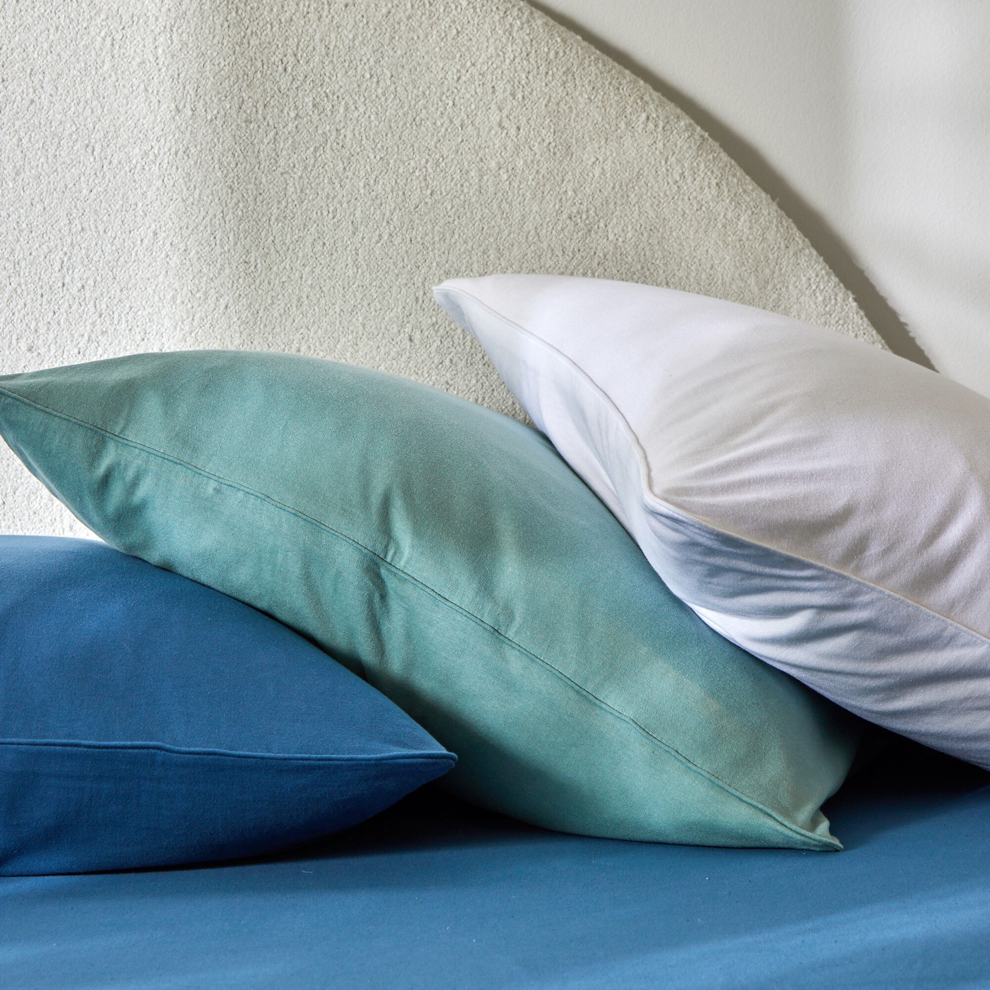 Linge de lit uni en jersey passepoilé coton