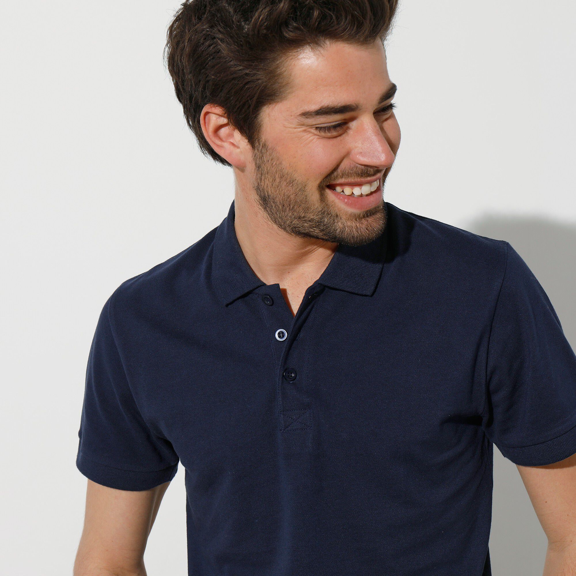 Polo uni maille piquée manches courtes