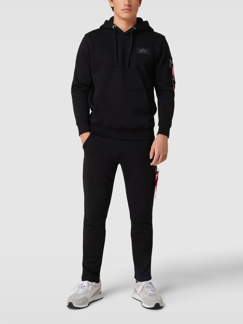 Sweatpants mit Label-Applikation Modell 'X-FIT' in schwarz