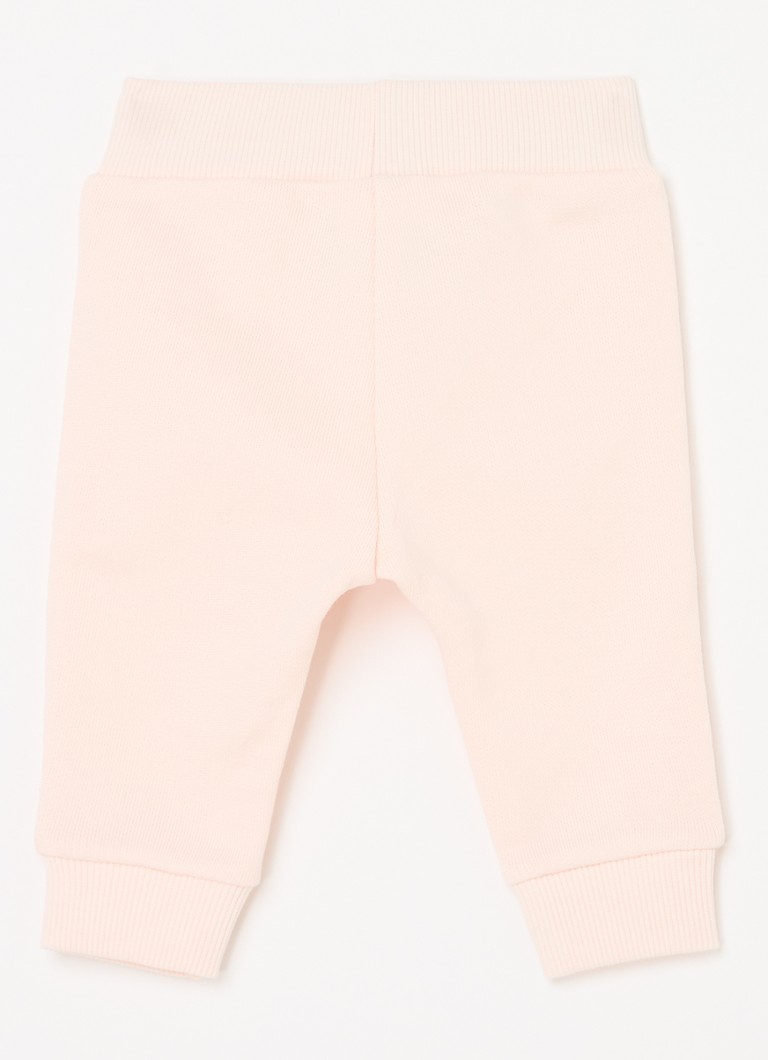 Pantaloni de trening Benetton cu croială conică și broderie.