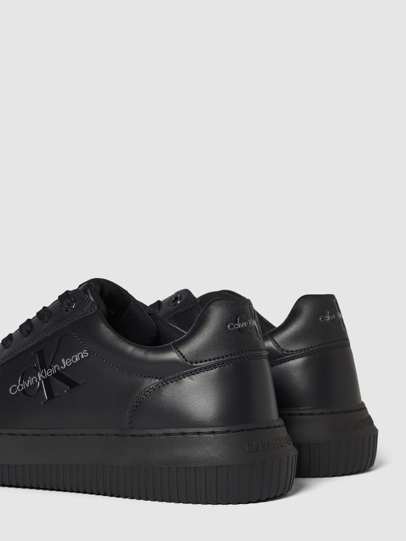 Sneaker mit Logo- und Label-Schriftzug in black