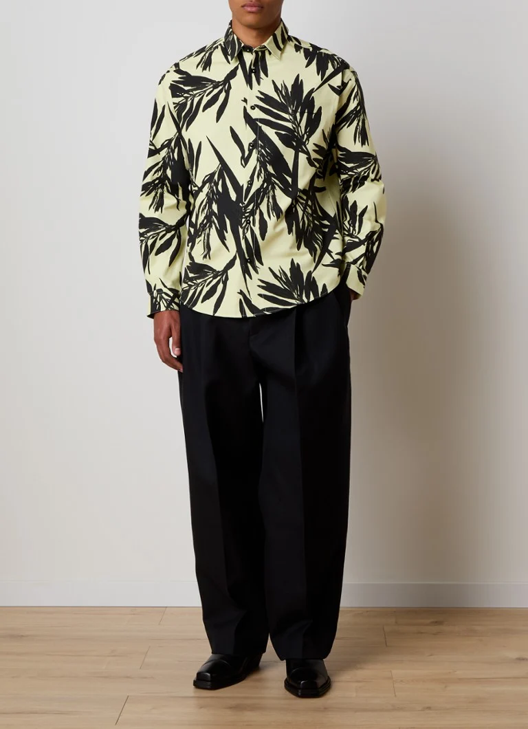 Pantaloni cu croi larg și buzunare laterale din lână de la Jacquemus.