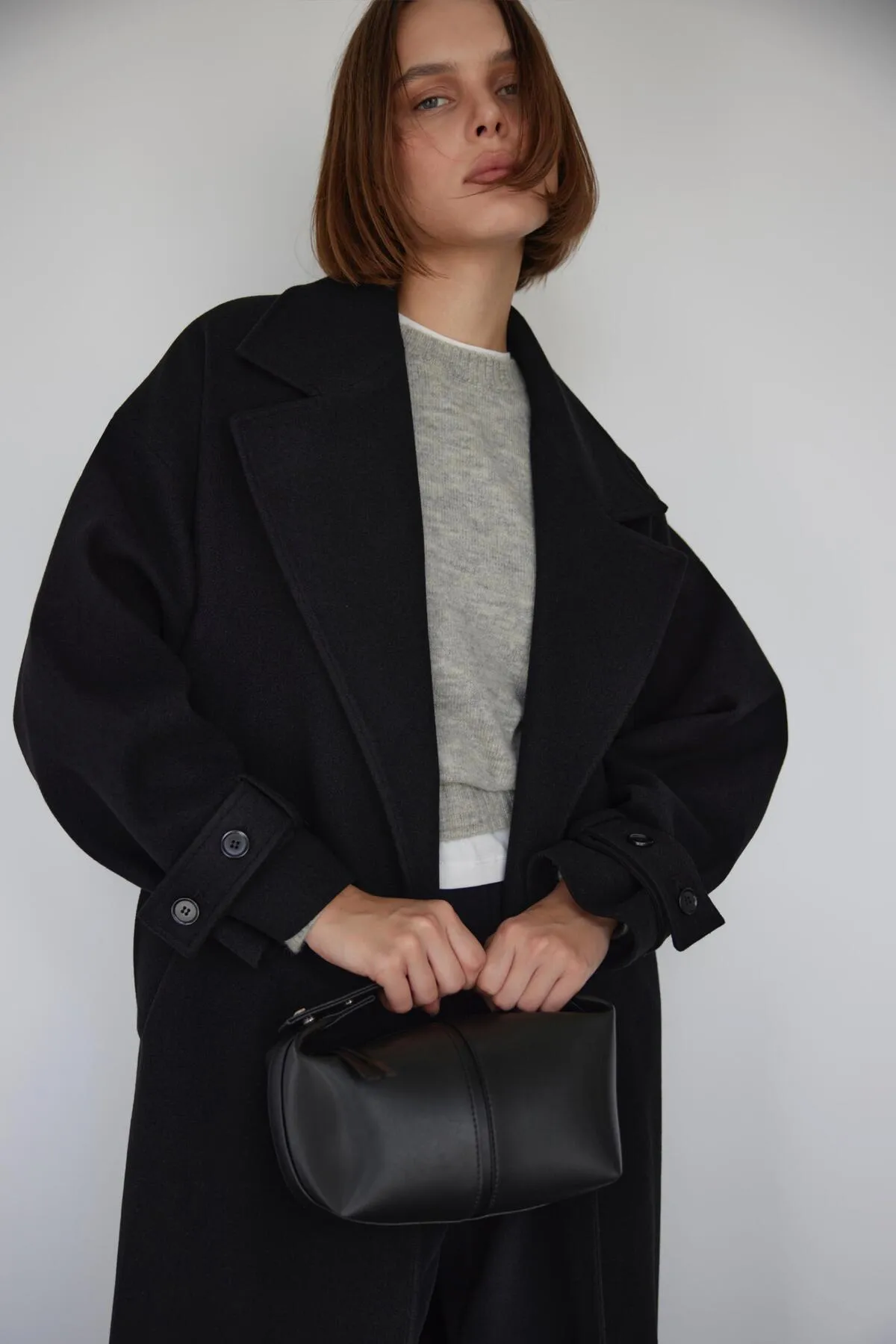 Suud Collection  Schwarze Archi-Minitasche aus Leder