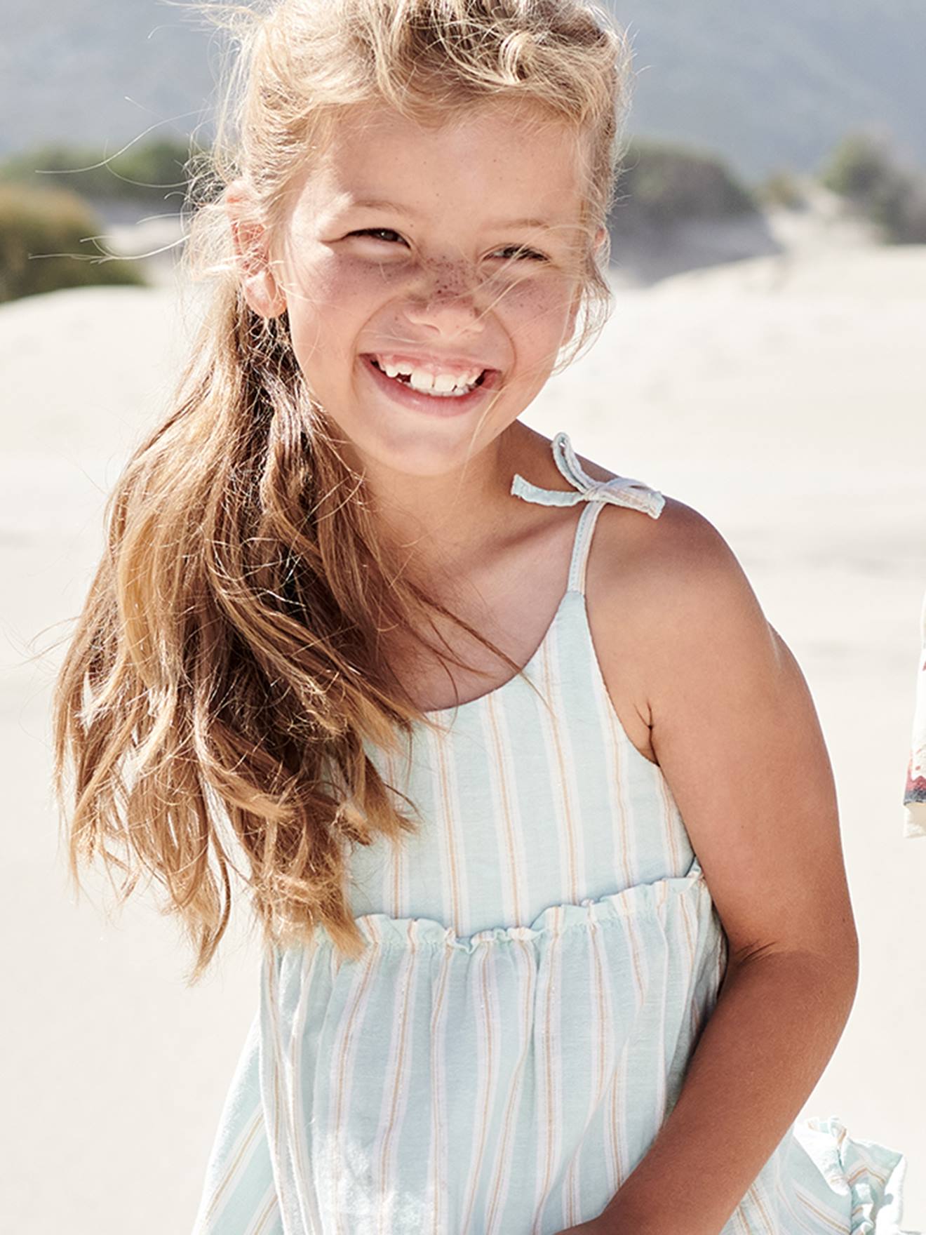 Robe à bretelles rayée fil brillant fille bleu pâle