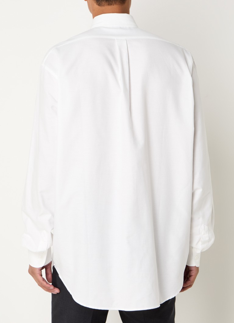 Camisa oversized Sinclair da Frankie Shop com bolso no peito.