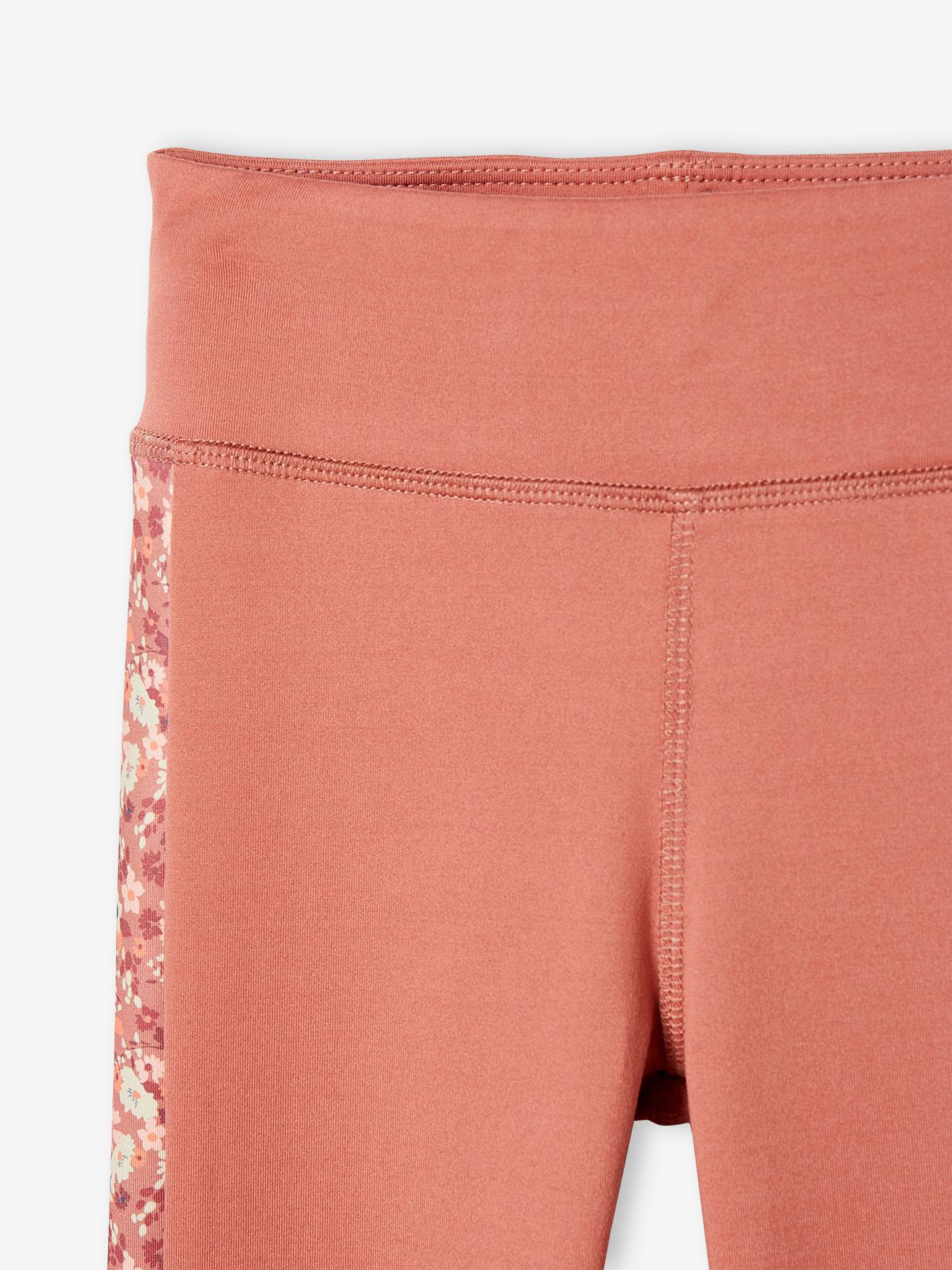 Legging sport matière technique fille bande côtés motifs fleurs terracotta
