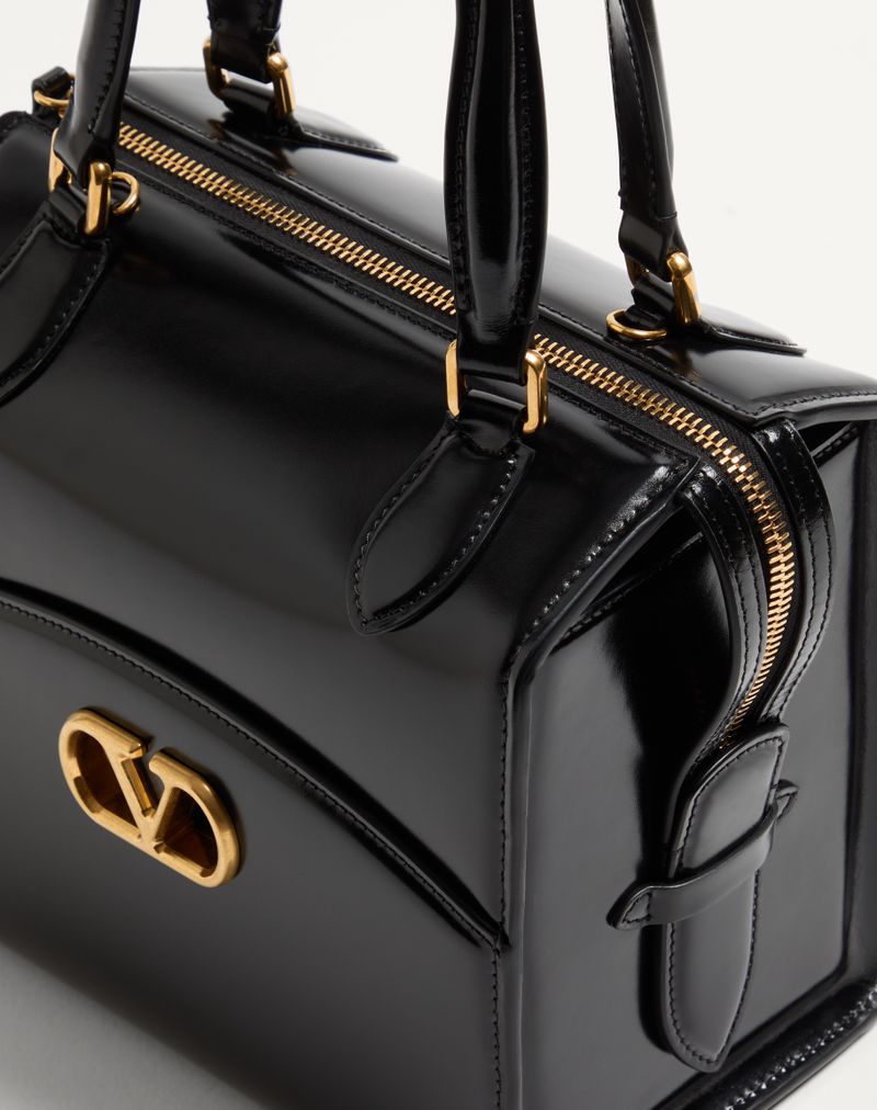 Bolsa Valentino Garavani Vain-Case em couro de bezerro brilhante