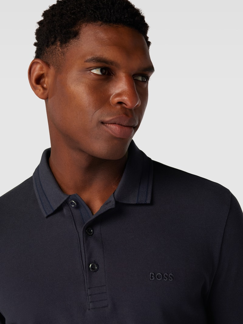 Poloshirt mit Kontraststreifen Modell 'Plisy' in marineblau