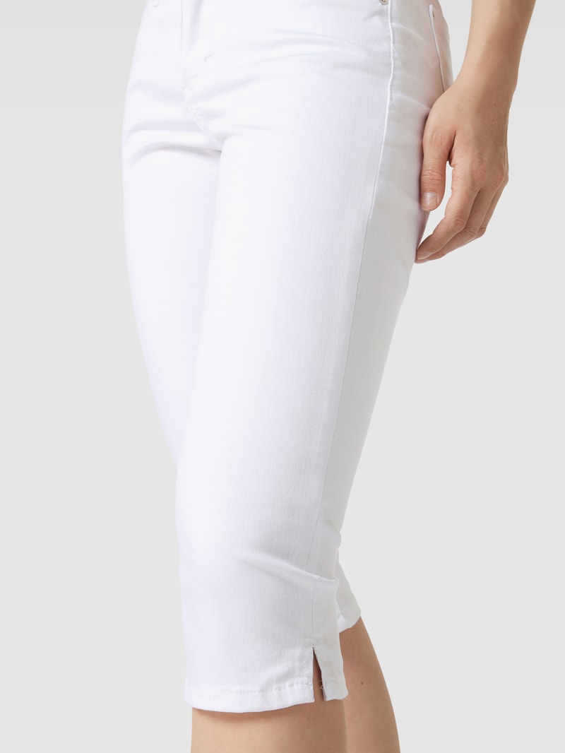 Caprijeans mit Eingrifftaschen in weiß